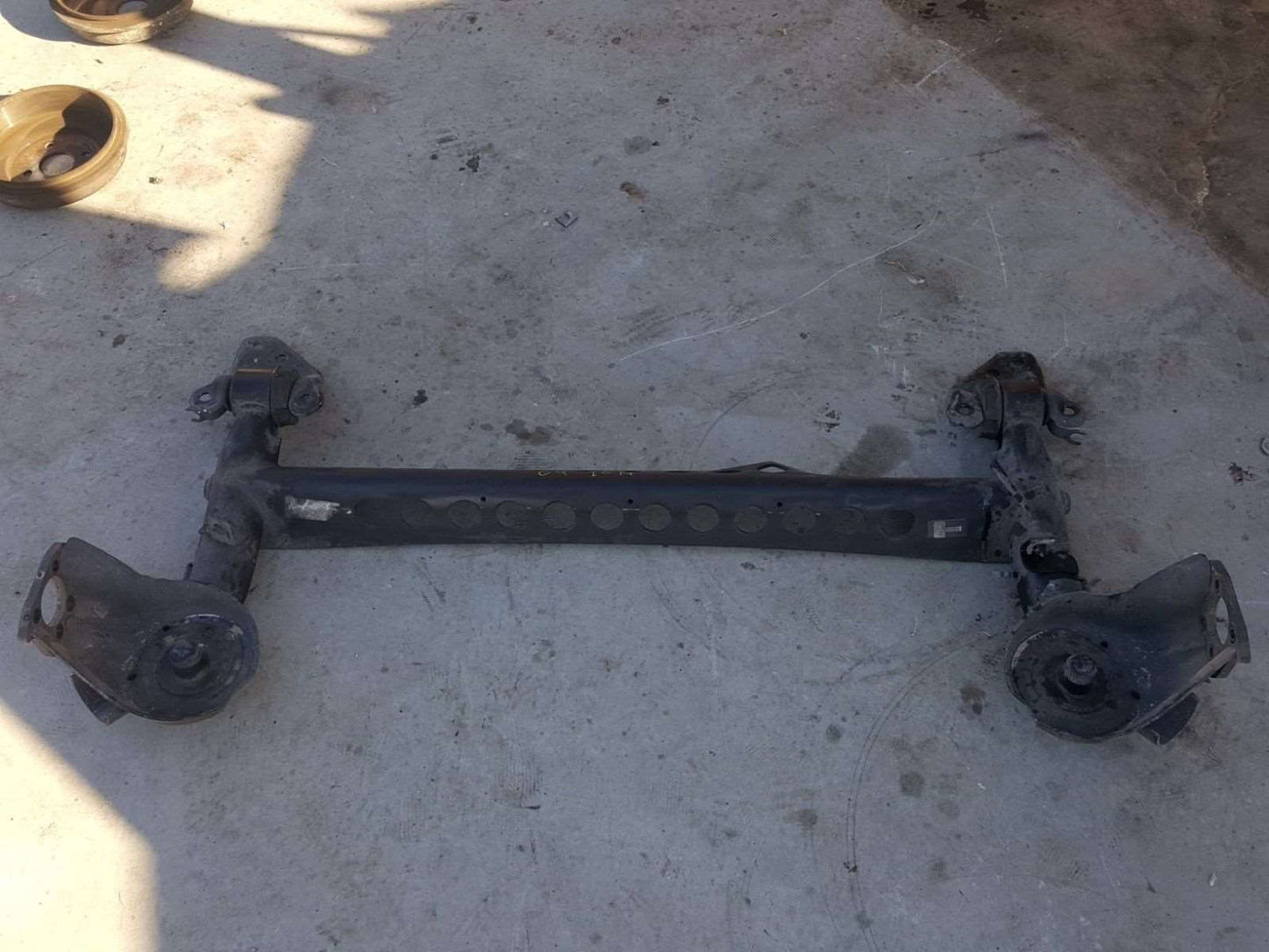 2004-2005 Saturn Ion Rear Suspension Subframe Crossmember - Used OEM