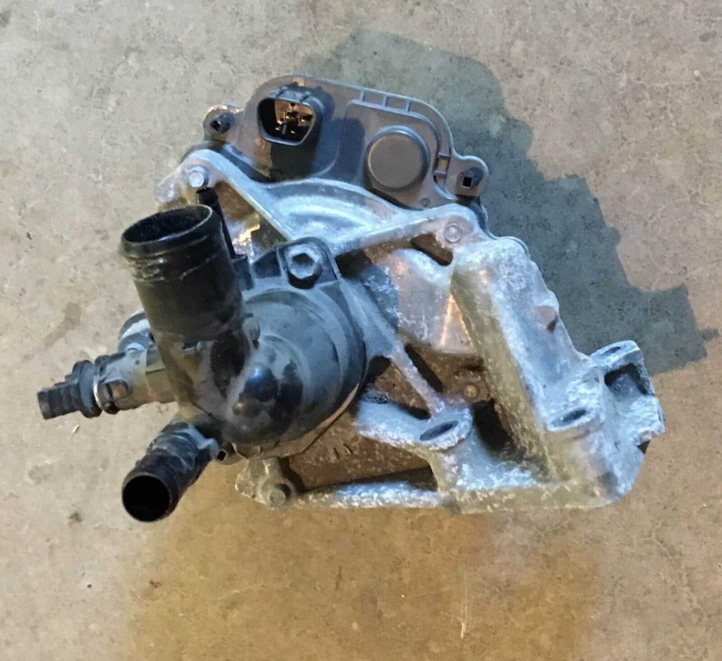 2012-2014 Toyota Prius C Water Pump with Coolant Thermostat Housing - Used OEM