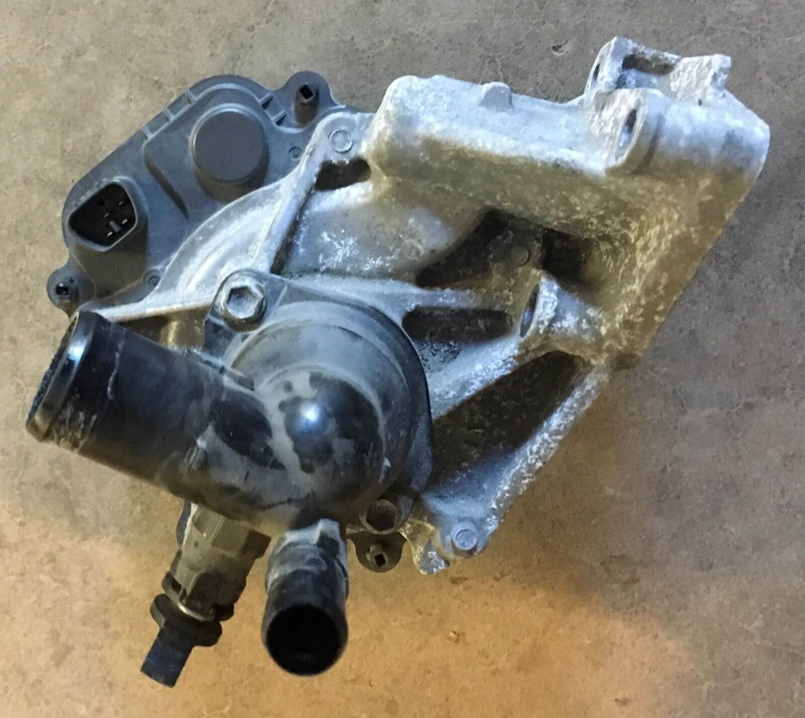 2012-2014 Toyota Prius C Water Pump with Coolant Thermostat Housing - Used OEM